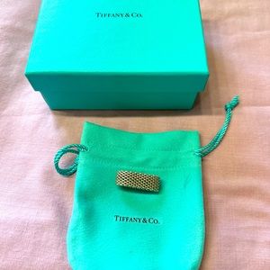 Tiffany & Co authentic mess ring, size 6 or 7, excellent condition.